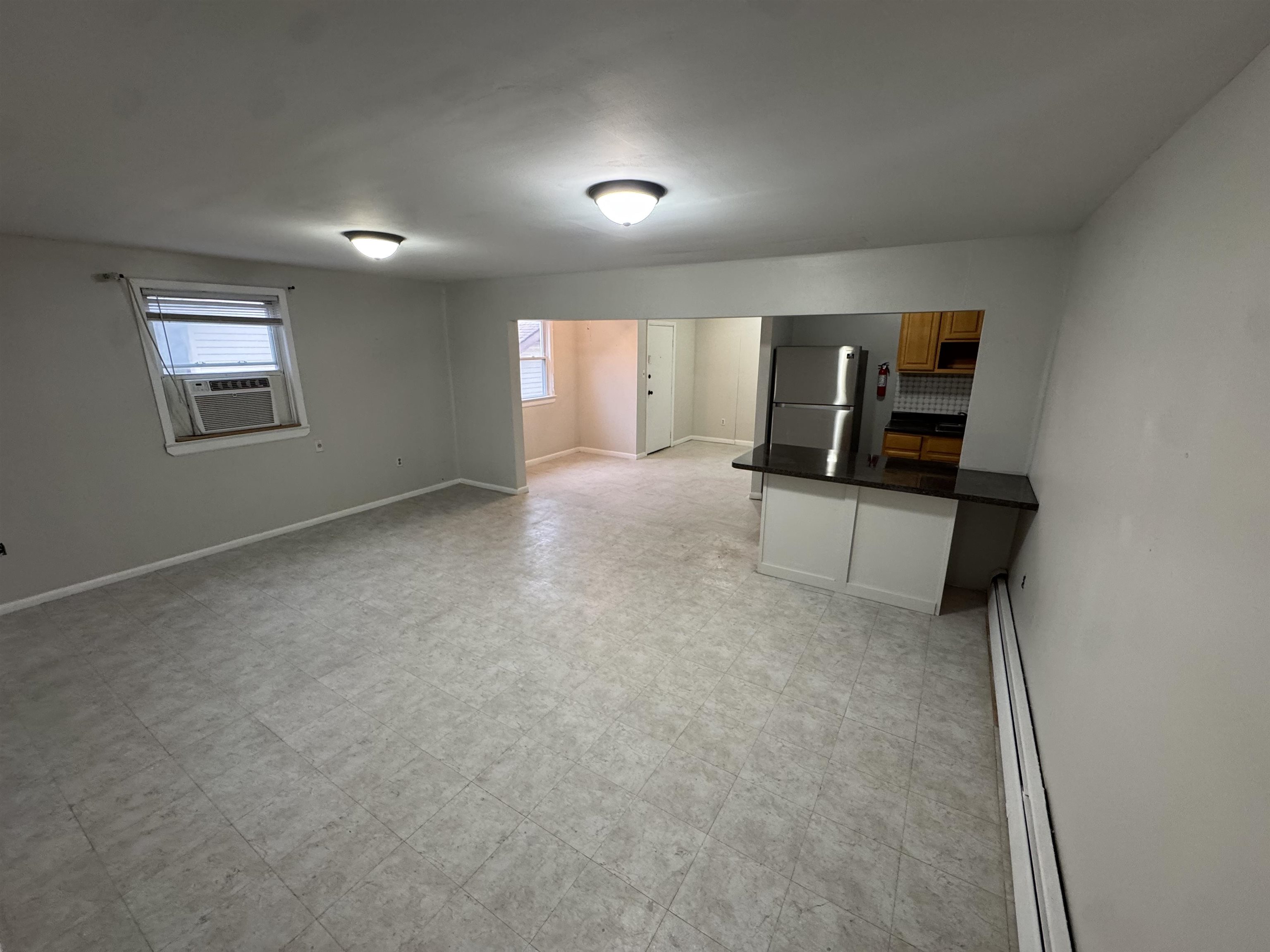 103 Prospect Avenue, Unit 2 Bayonne, NJ 07002 - Photo 4 of 12 a view of workspace and window