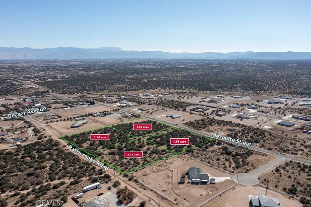 an aerial view of beach and city