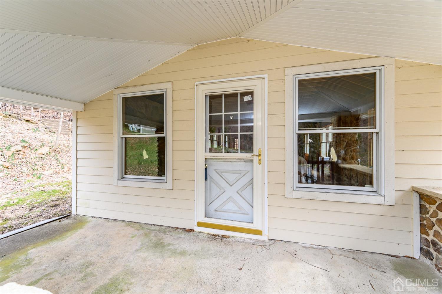 146 Millbrook Road Washington, NJ 07882 - Photo 3 of 25 front view of a house with a outdoor space