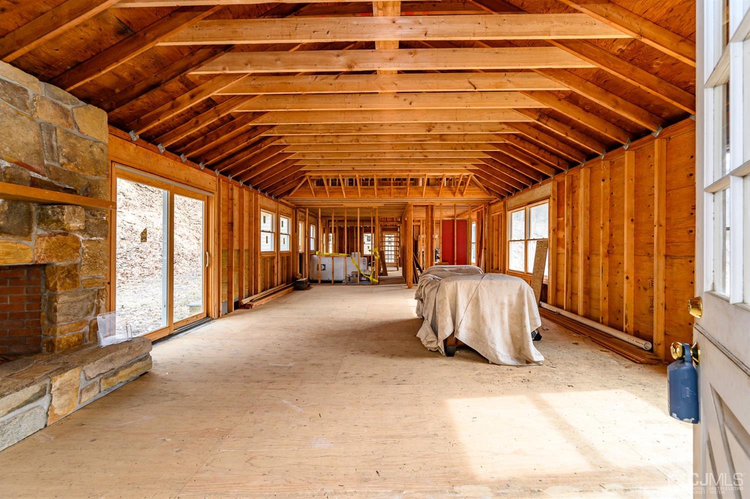 146 Millbrook Road Washington, NJ 07882 - Photo 4 of 25 a view of porch with a ceiling fan
