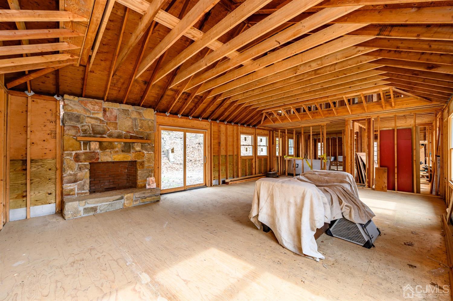 146 Millbrook Road Washington, NJ 07882 - Photo 5 of 25 a view of a hall with wooden floor