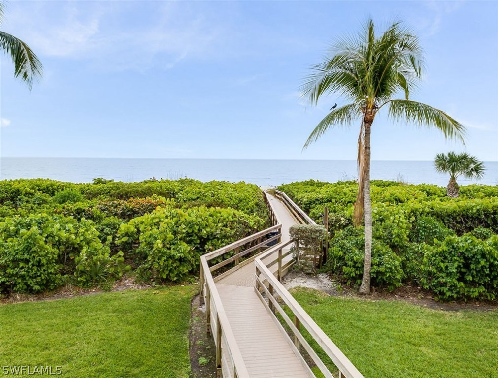 1299 Middle Gulf Drive, Unit 183 Sanibel, FL 33957 - Photo 1 of 24 a view of a backyard with plants