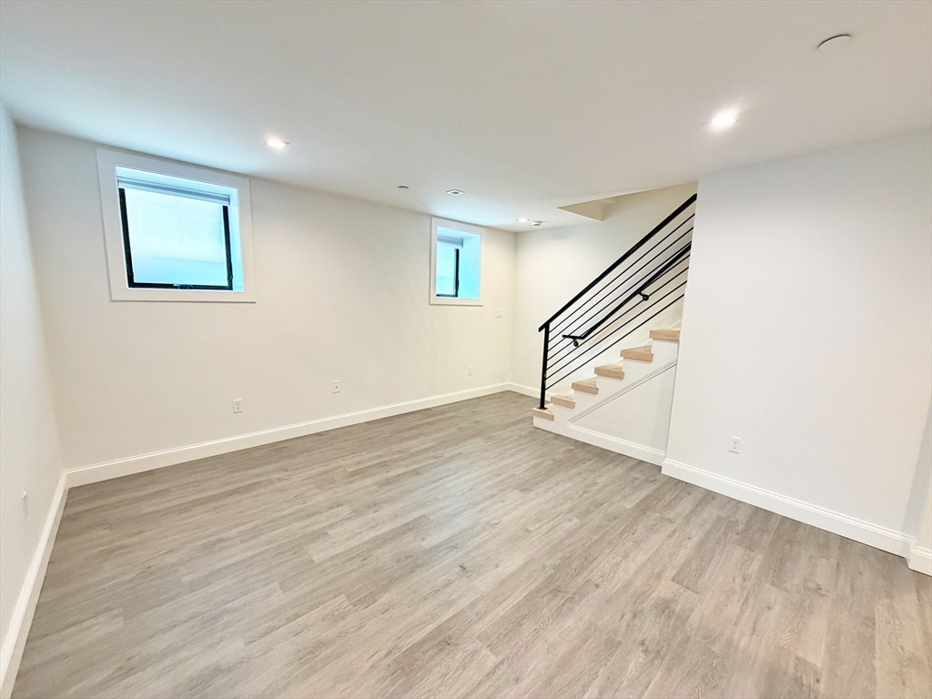 182 Webster Street, Unit 1 Boston, MA 02128 - Photo 30 of 41 a view of an entryway with wooden floor