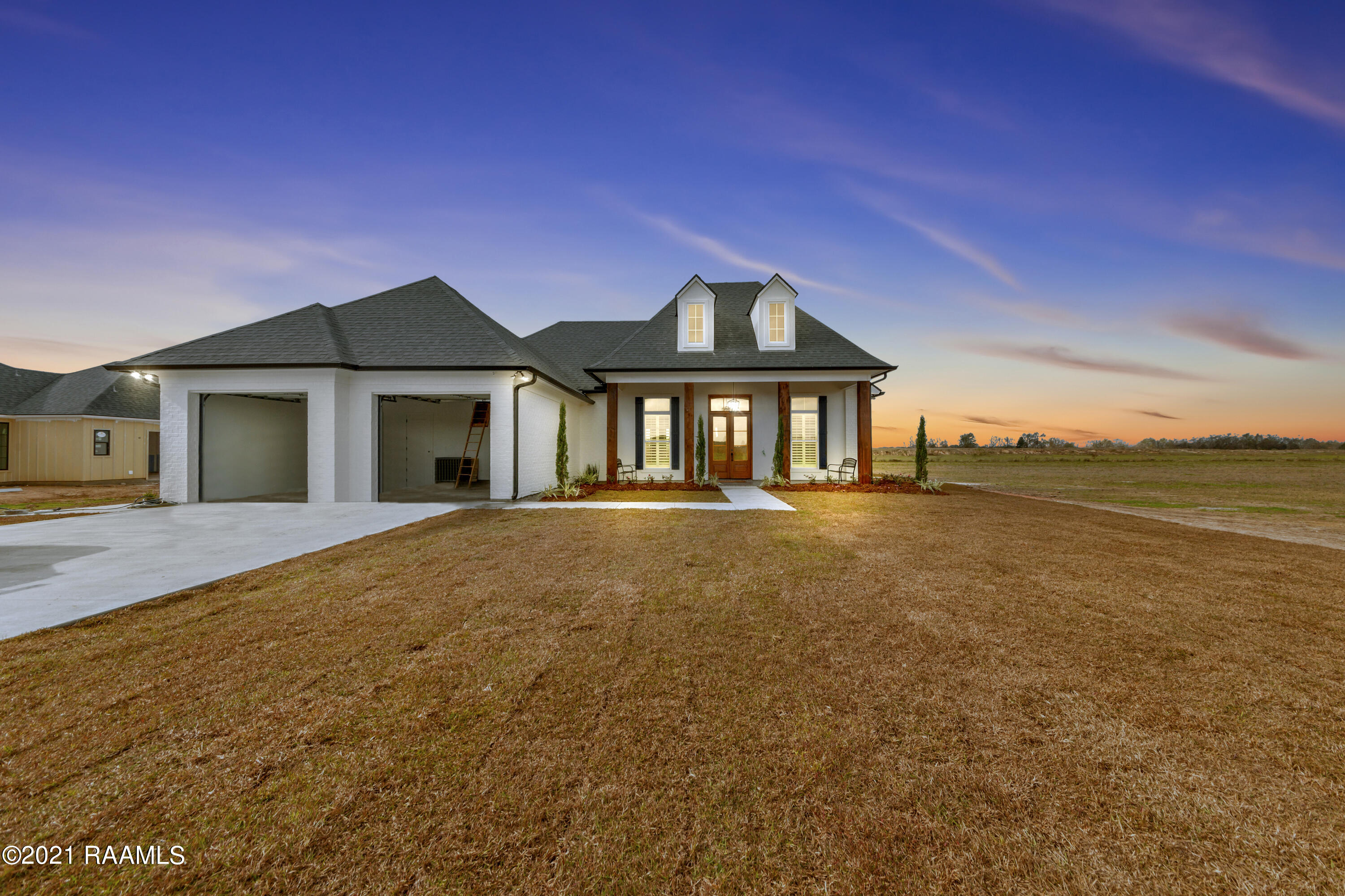 199 Cypress Bend Road Scott, LA 70583 - Photo 1 of 43 199CypressEXT-Twilight