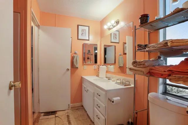 a kitchen with a stove and a sink