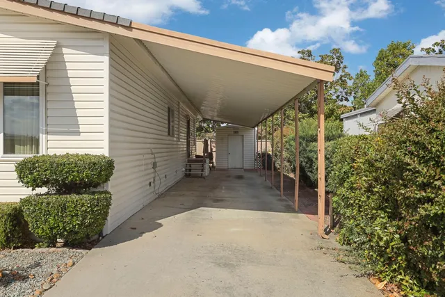a view of a back yard of the house