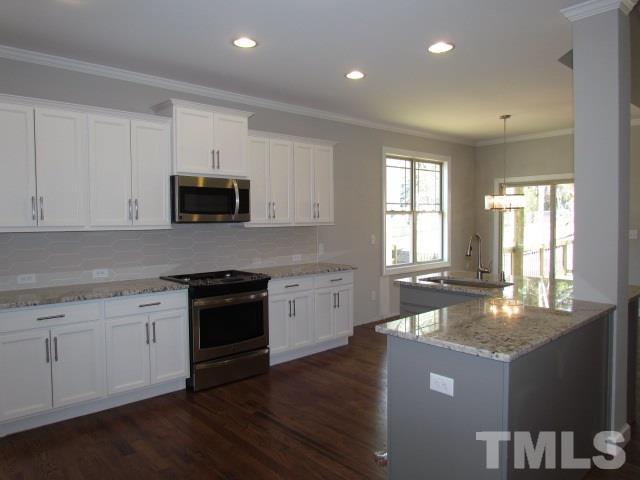 1644 Forest Road Wake Forest, NC 27587 - Photo 7 of 23 Stainless steel appliance package: gas range, microwave, dishwasher, disposal