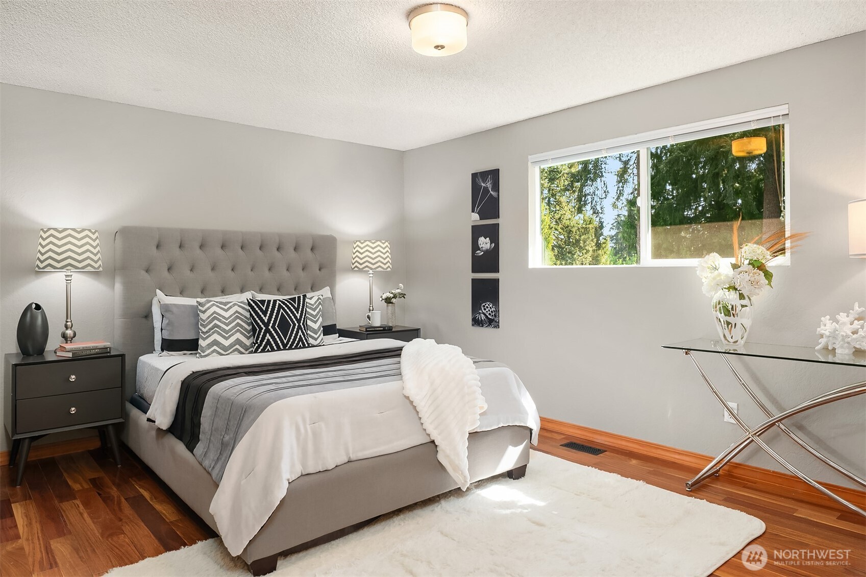 21331 2nd Avenue Southeast Bothell, WA 98021 - Photo 13 of 34 a bedroom with a bed and window