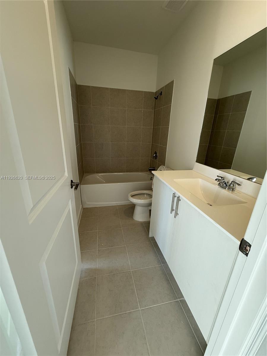 26846 Southwest 121st Court Homestead, FL 33032 - Photo 9 of 37 a utility room with dryer and washer