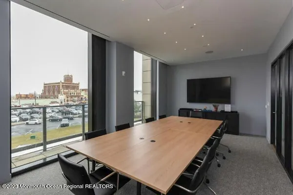 a view of a livingroom with furniture and window