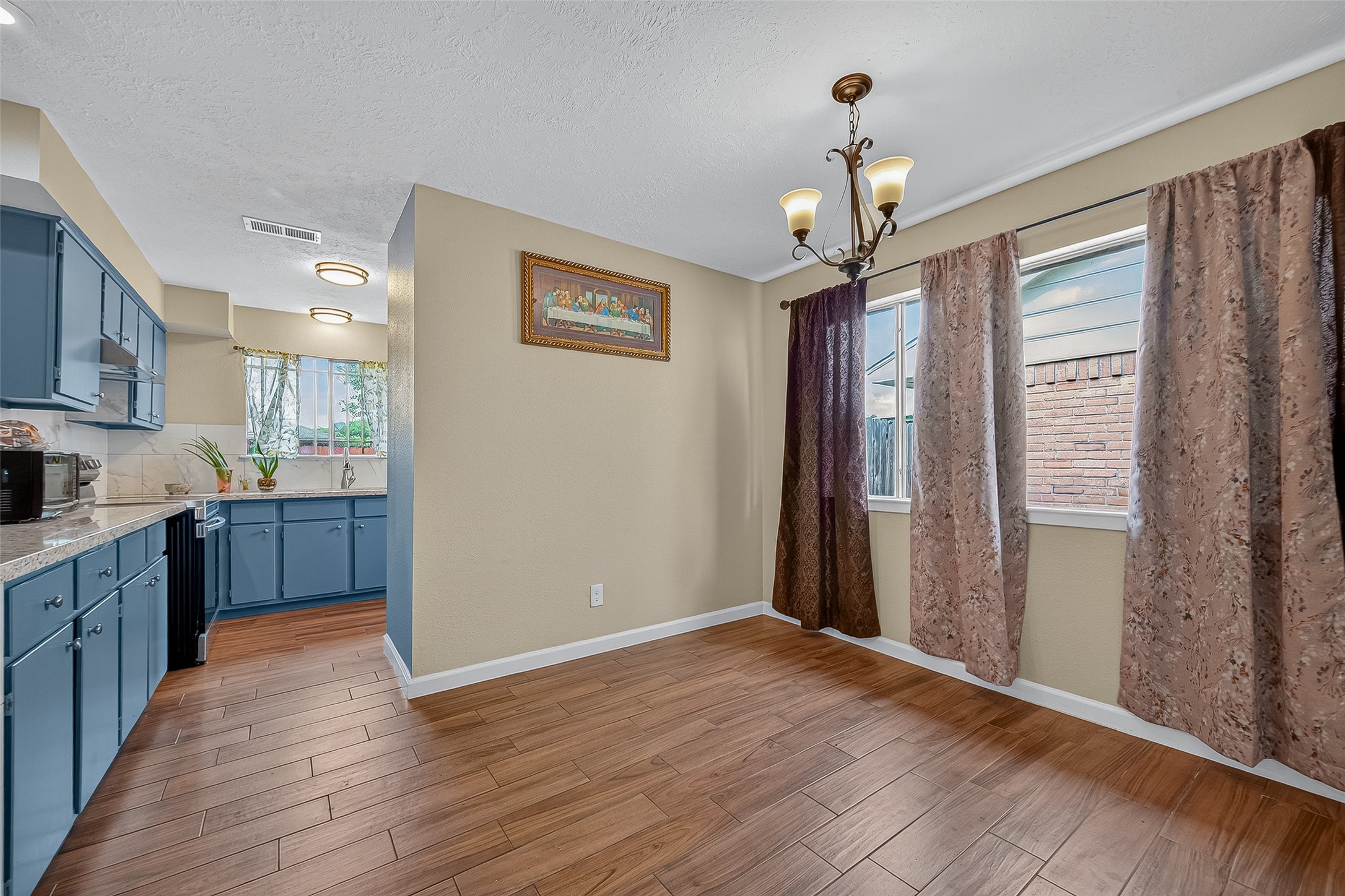 2719 Flintrock Circle Houston, TX 77067 - Photo 6 of 22 a view of a kitchen with a sink and a window