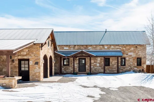a view of a terrace with wooden floor and city view