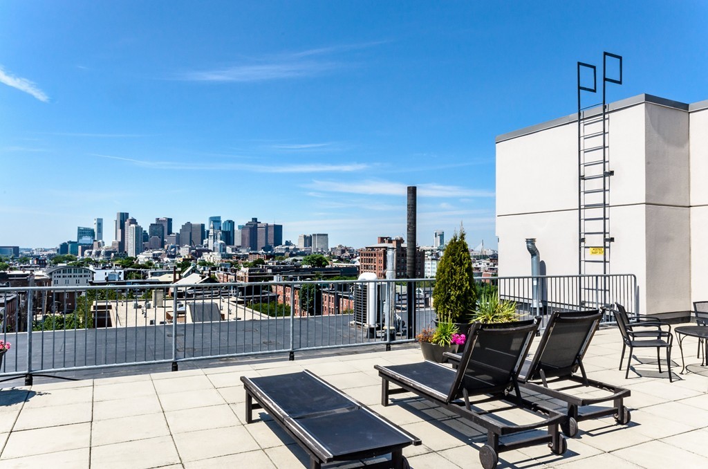 156 Porter Street, Unit 236 Boston, MA 02128 - Photo 12 of 16 a view of a terrace with seating area