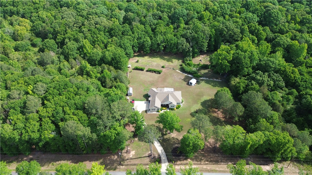 190 Fred Bradford Road Iva, SC 29655 - Photo 2 of 32 This expansive estate offers a serene retreat surrounded by lush woodlands and ample private yard space.