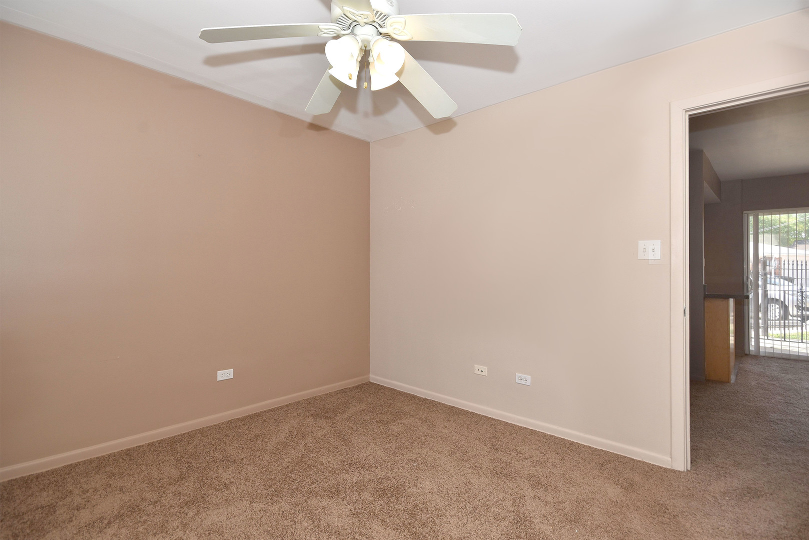 6152 West Rosedale Avenue, Unit 1 Chicago, IL 60646 - Photo 16 of 18 an empty room with a chandelier fan