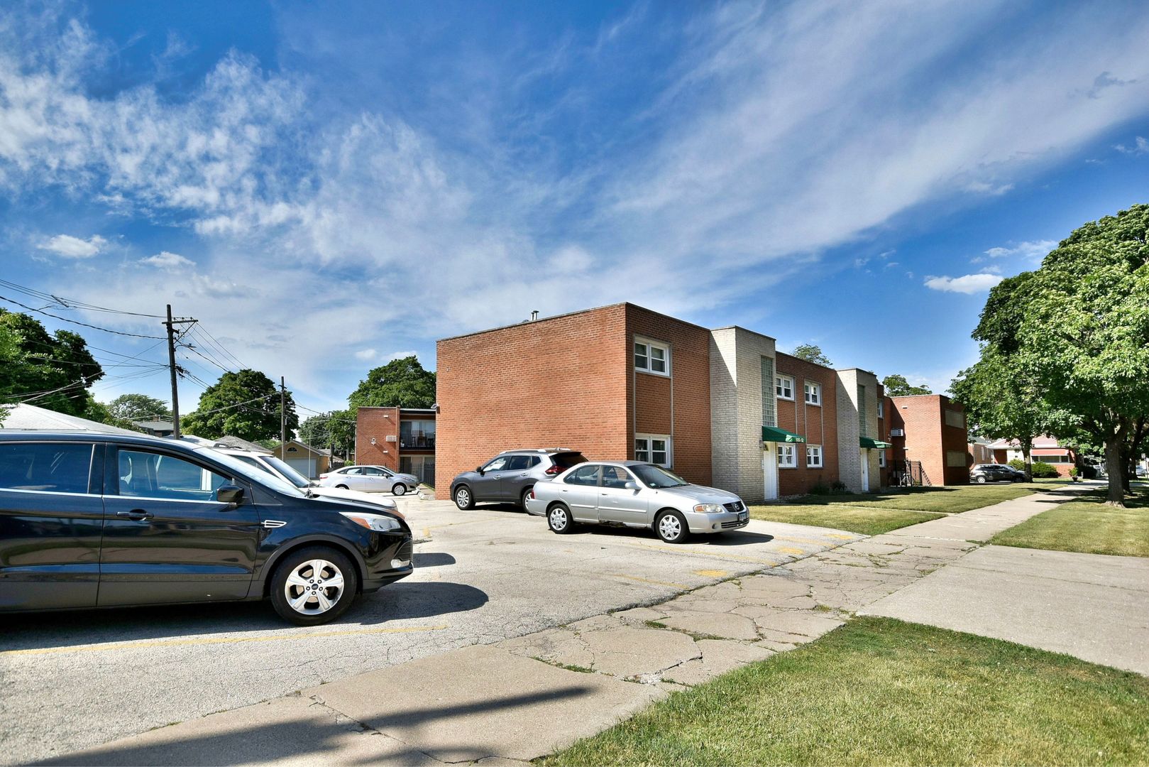 6152 West Rosedale Avenue, Unit 1 Chicago, IL 60646 - Photo 3 of 18 a view of a car parked in front of a house