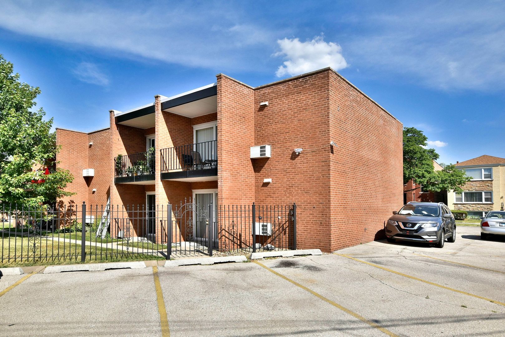 6152 West Rosedale Avenue, Unit 1 Chicago, IL 60646 - Photo 4 of 18 a street view along with residential houses