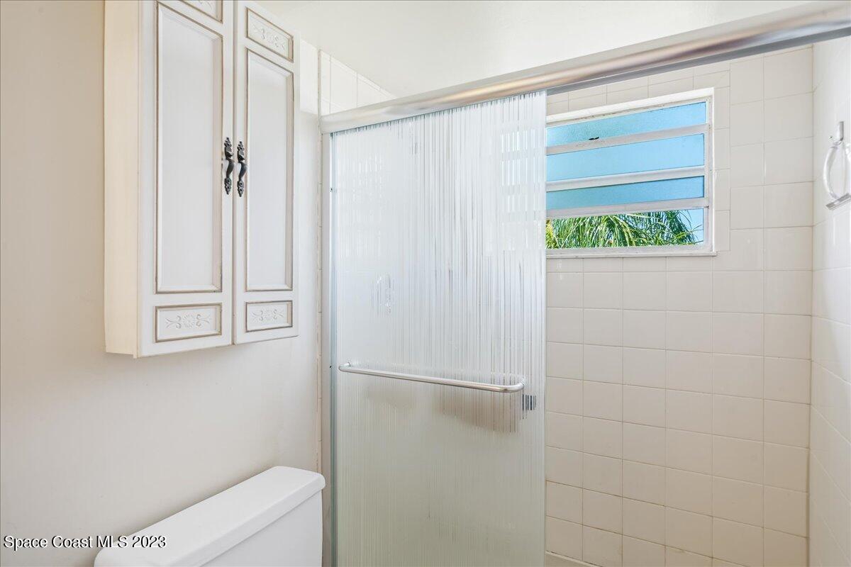 435 Dove Lane, Unit 810 Satellite Beach, FL 32937 - Photo 18 of 43 a bathroom with a shower