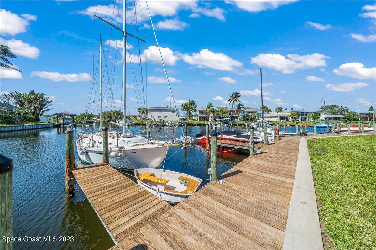 435 Dove Lane, Unit 810 Satellite Beach, FL 32937 - Photo 31 of 43 a view of a lake with sitting area