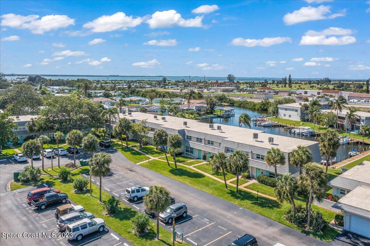 435 Dove Lane, Unit 810 Satellite Beach, FL 32937 - Photo 41 of 43 a view of a city with lots of trees