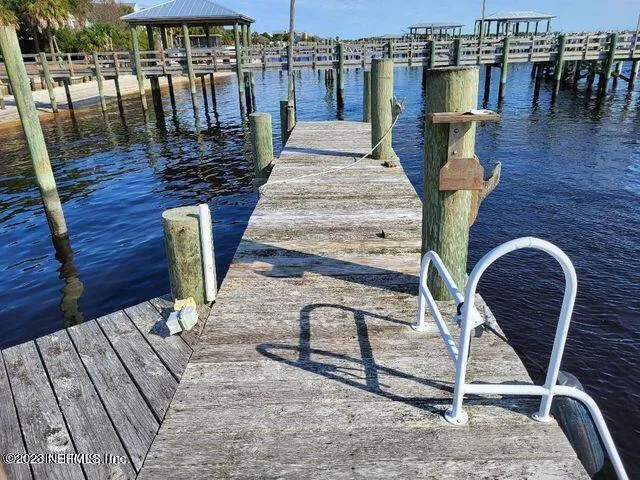 a view of a balcony with chairs