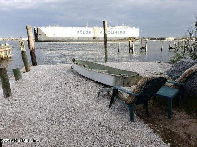 a view of a ocean with sunset