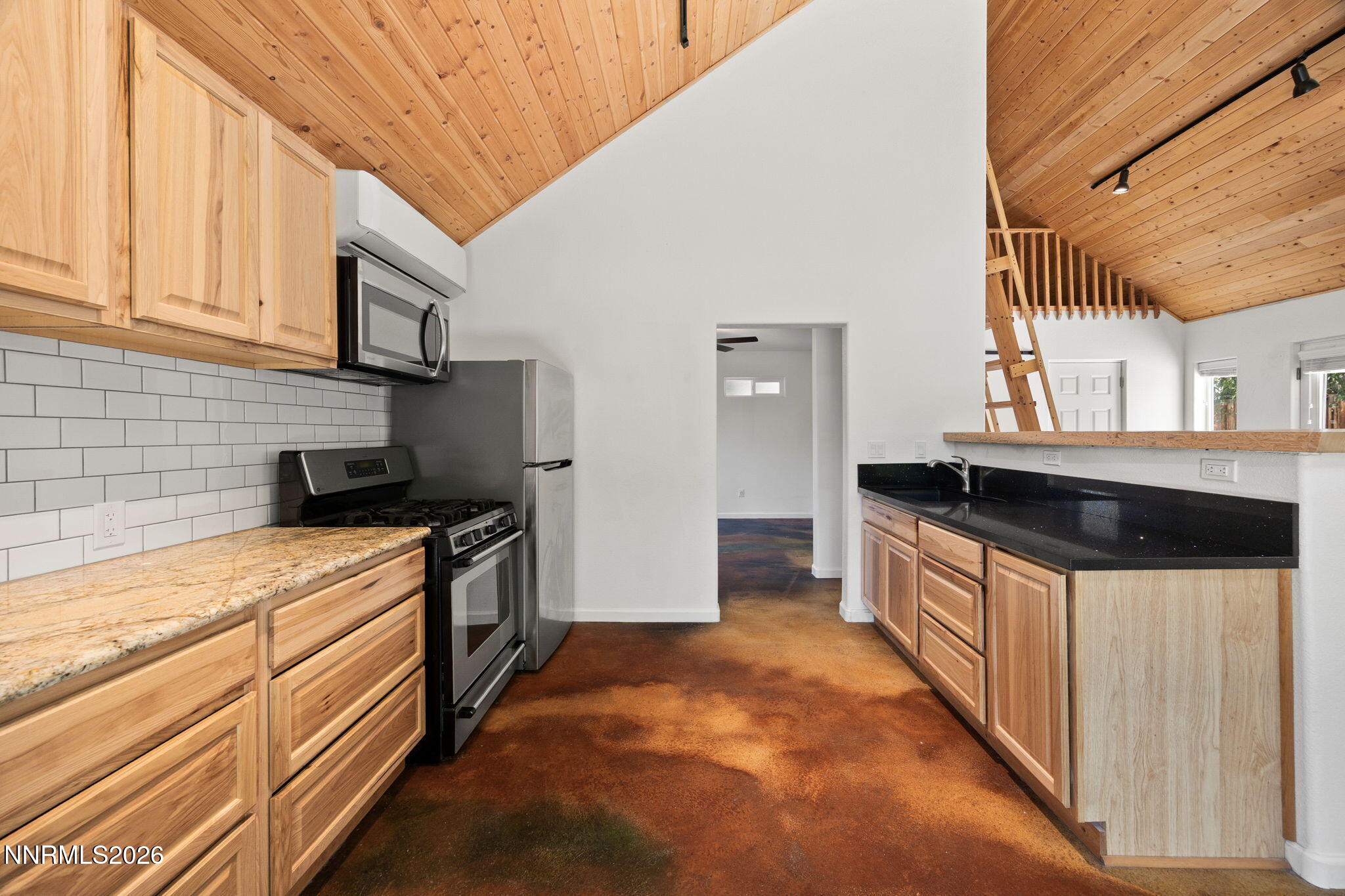 1350 Ridgeway Court Reno, NV 89503 - Photo 11 of 34 a kitchen with stainless steel appliances a sink and a stove