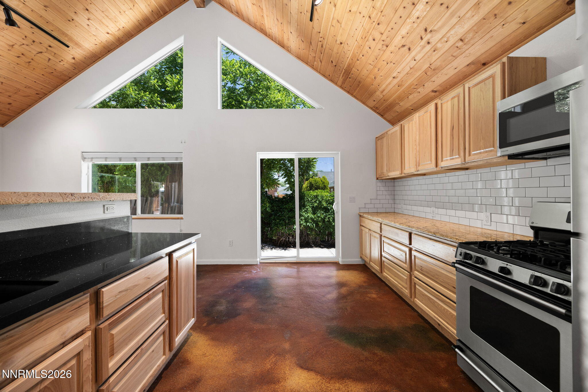 1350 Ridgeway Court Reno, NV 89503 - Photo 12 of 34 a kitchen with a stove and a microwave