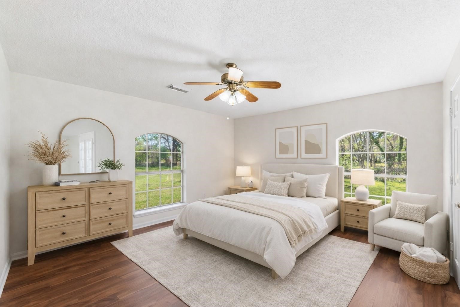 7825 Hughes Ranch Road Pearland, TX 77581 - Photo 18 of 28 (Virtually Staged)
The same bedroom styled to life — a warm, airy retreat with personality and plenty of room to make it your own.