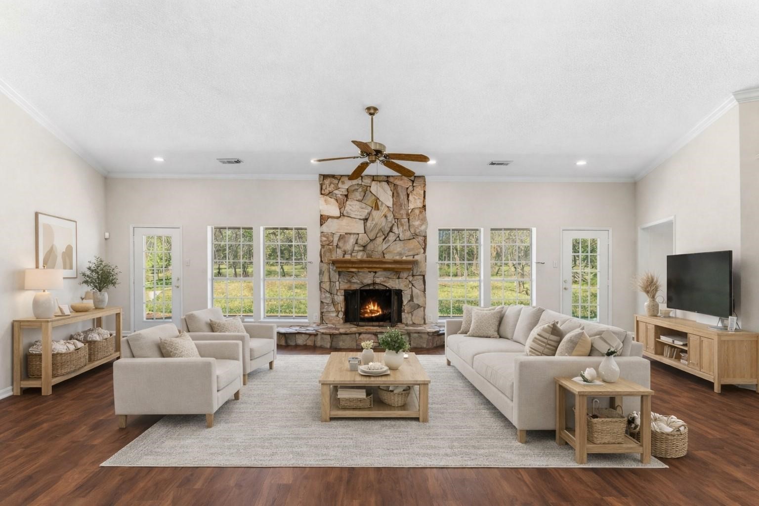 7825 Hughes Ranch Road Pearland, TX 77581 - Photo 5 of 28 (Virtually Staged)
Another angle of the grand living space — open, versatile, and warm. Whether it's a quiet evening in or a full house of guests, this room rises to every occasion.