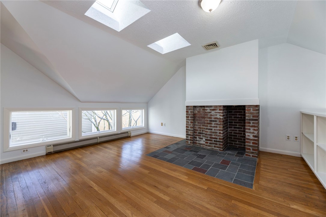 37 Pratt Street Providence, RI 02906 - Photo 22 of 50 2nd floor library with cathedral ceiling, skylights and a balcony overlooking the 1st floor.