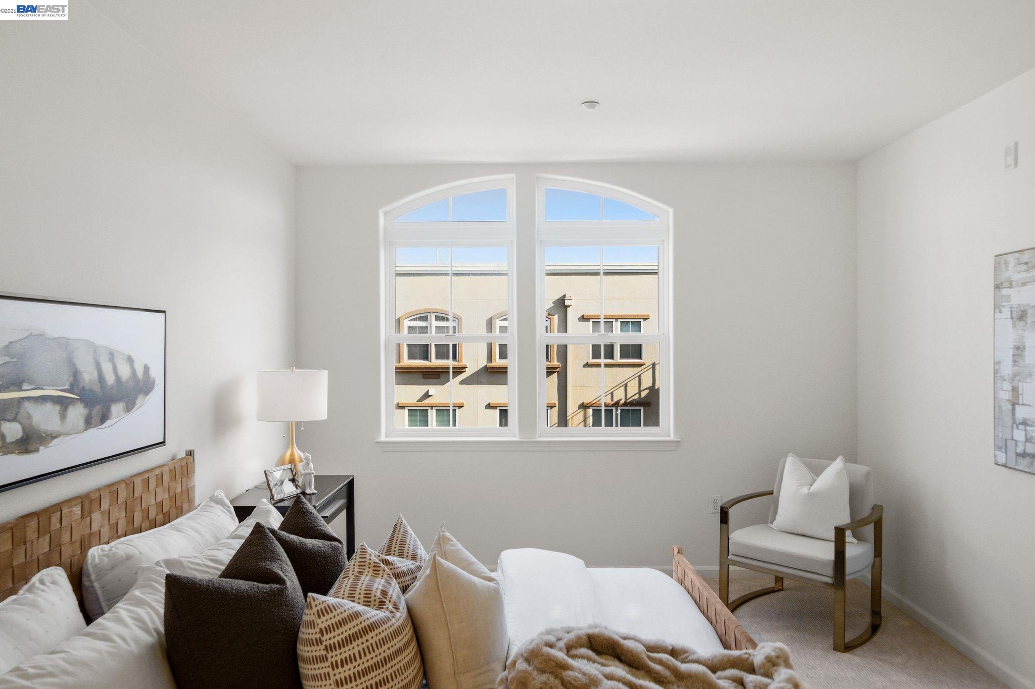 49002 Cinnamon Fern Common, Unit 507 Fremont, CA 94539 - Photo 24 of 41 a living room with furniture and a window