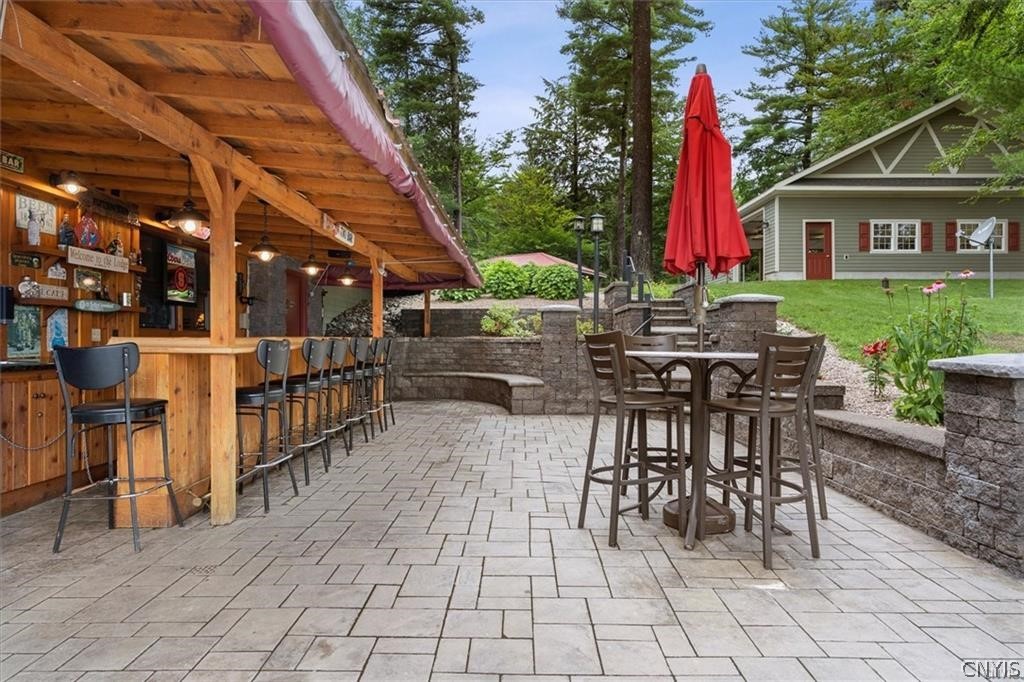 5494 North Shore Road Greig, NY 13312 - Photo 7 of 49 Lower level outdoor bar/patio area