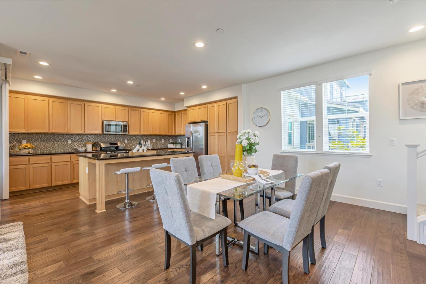 103 Incense Terrace Sunnyvale, CA 94086 - Photo 15 of 42 a view of a dining room with furniture and wooden floor