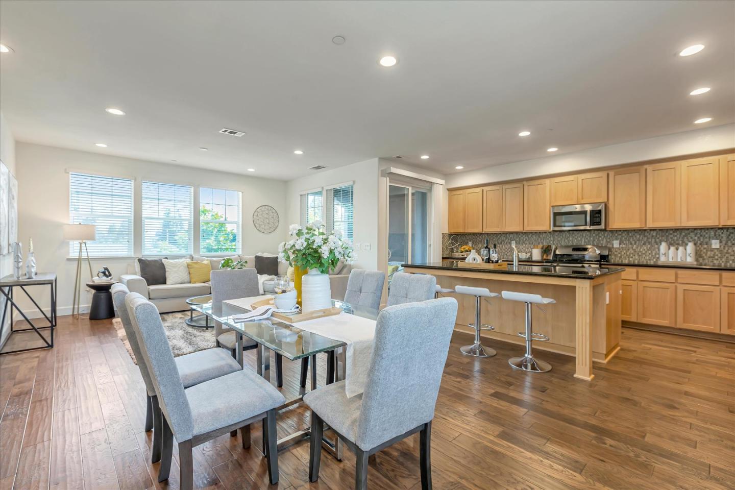 103 Incense Terrace Sunnyvale, CA 94086 - Photo 16 of 42 a large kitchen with a table and chairs