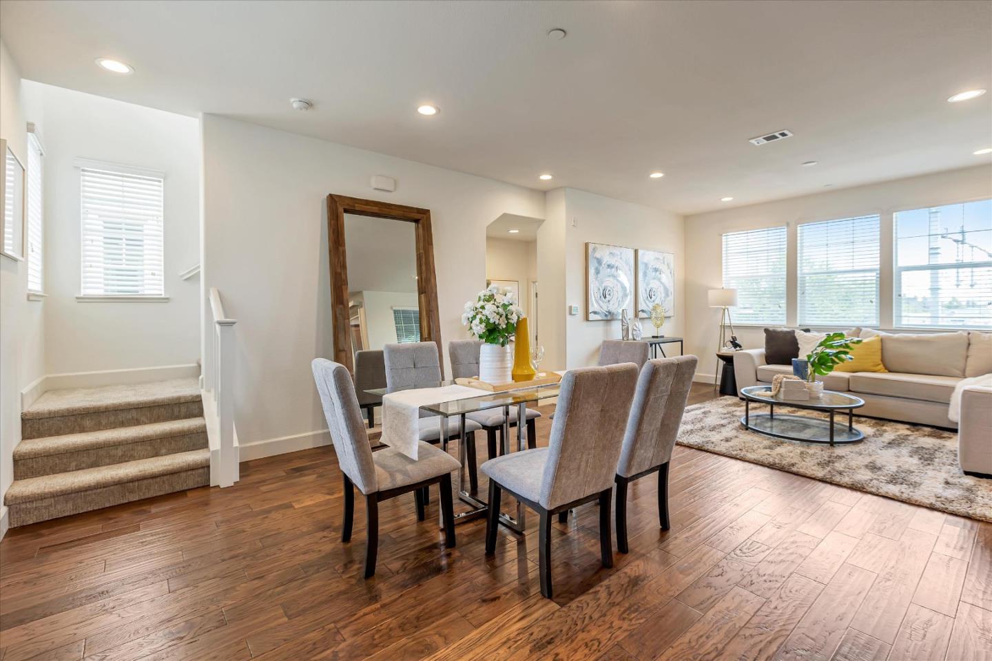103 Incense Terrace Sunnyvale, CA 94086 - Photo 17 of 42 a view of a dining room with furniture window and wooden floor