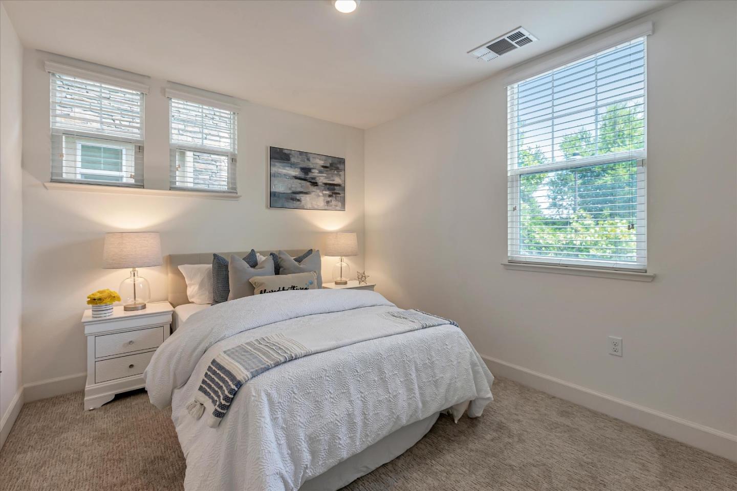 103 Incense Terrace Sunnyvale, CA 94086 - Photo 18 of 42 a bedroom with a bed and a window