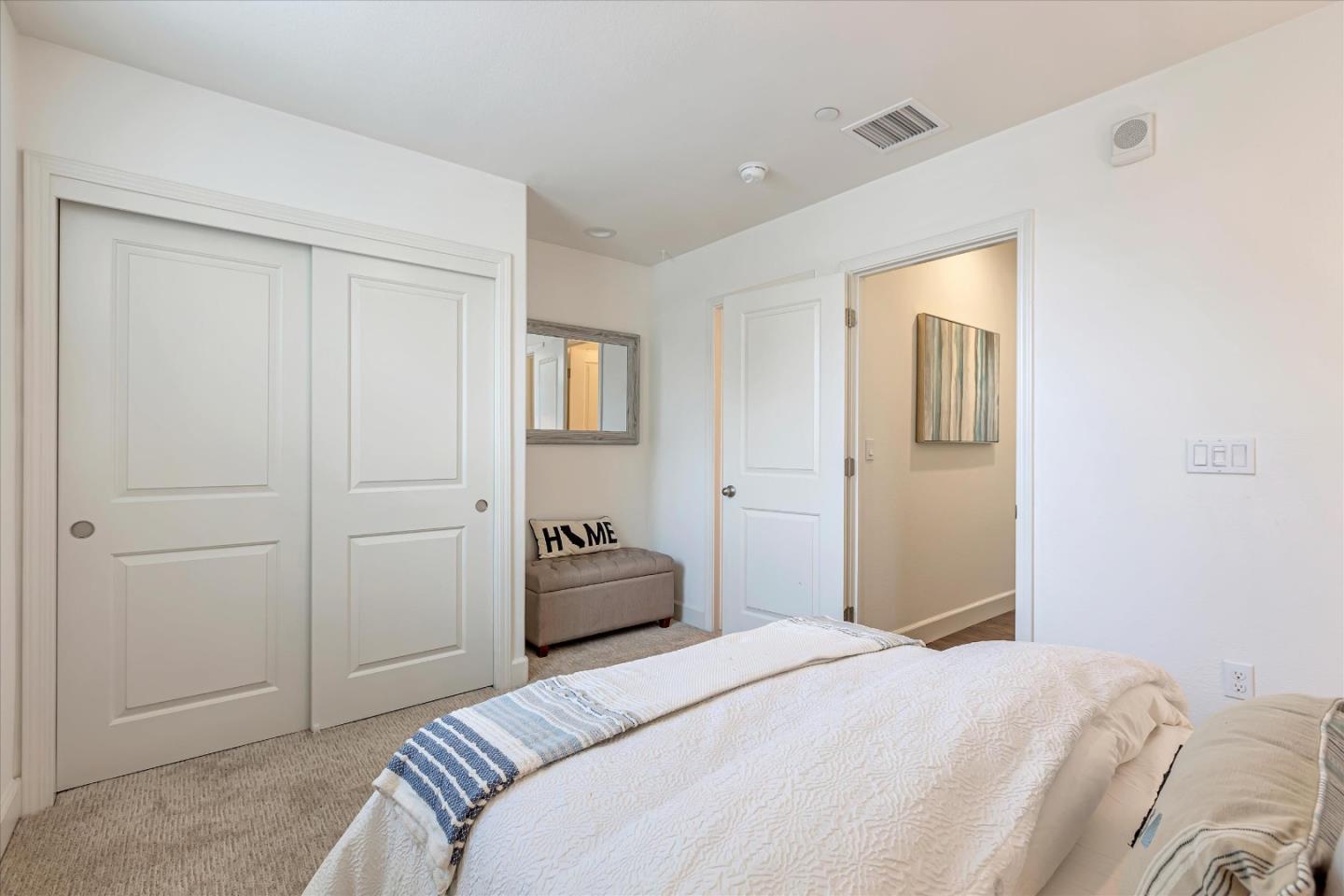 103 Incense Terrace Sunnyvale, CA 94086 - Photo 19 of 42 a bedroom with a bed and closet