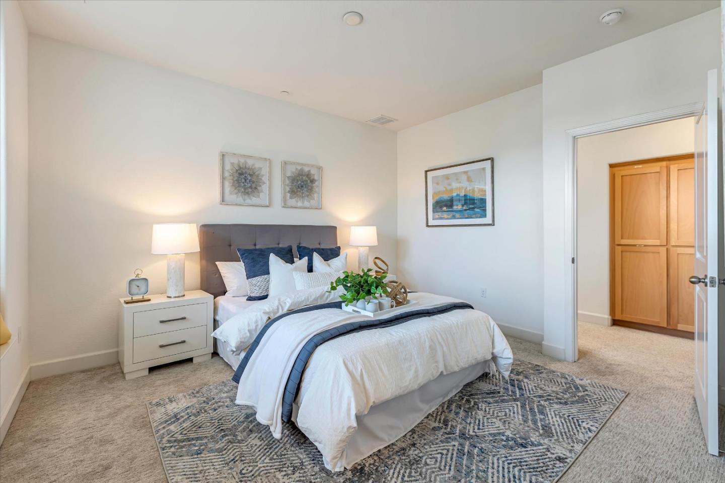 103 Incense Terrace Sunnyvale, CA 94086 - Photo 22 of 42 a bedroom with a bed and a window