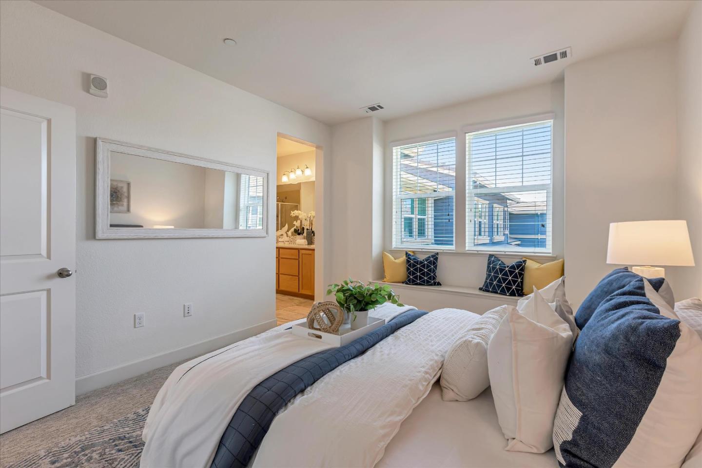 103 Incense Terrace Sunnyvale, CA 94086 - Photo 24 of 42 a bedroom with a bed and a couch