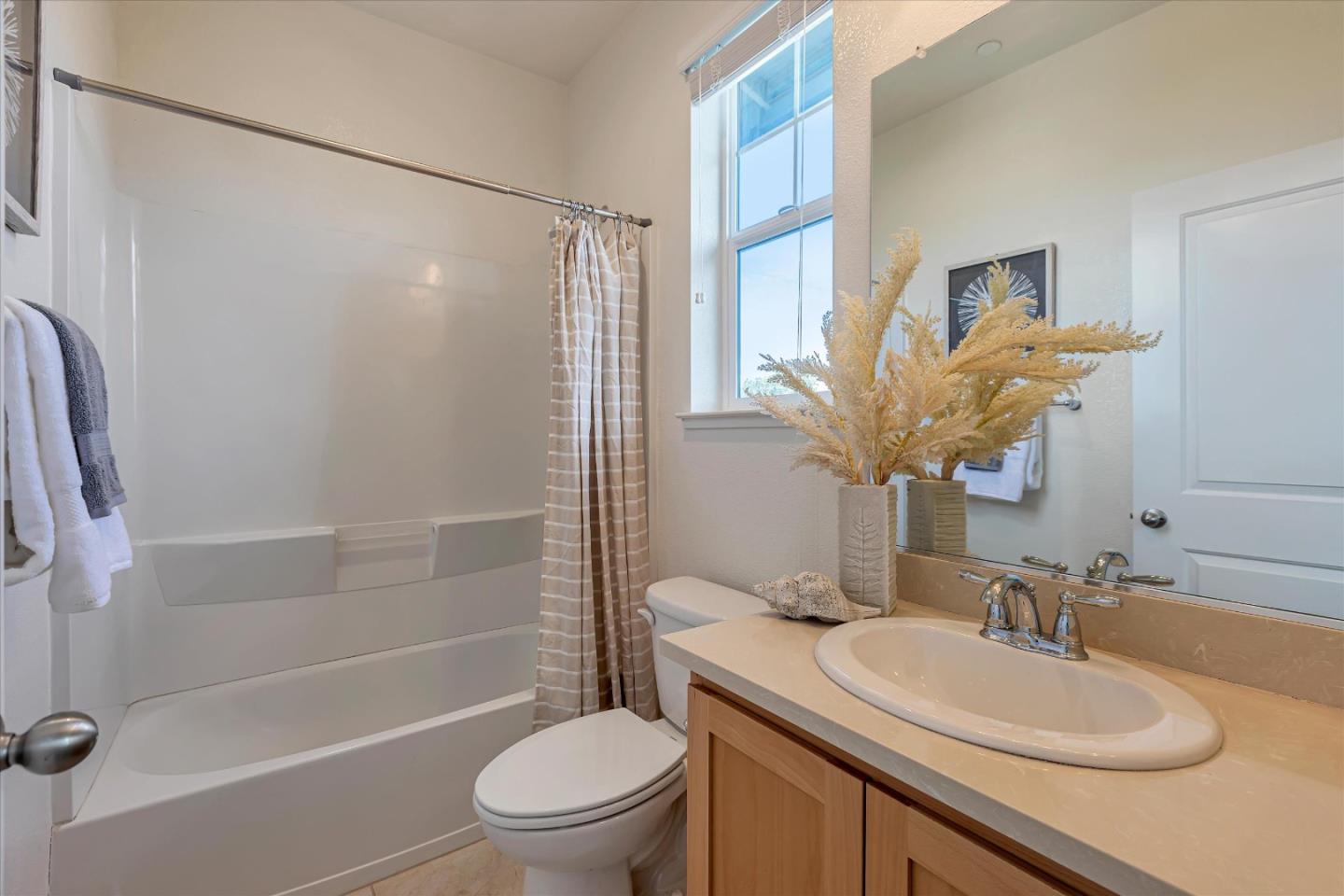 103 Incense Terrace Sunnyvale, CA 94086 - Photo 30 of 42 a bathroom with a sink toilet and shower