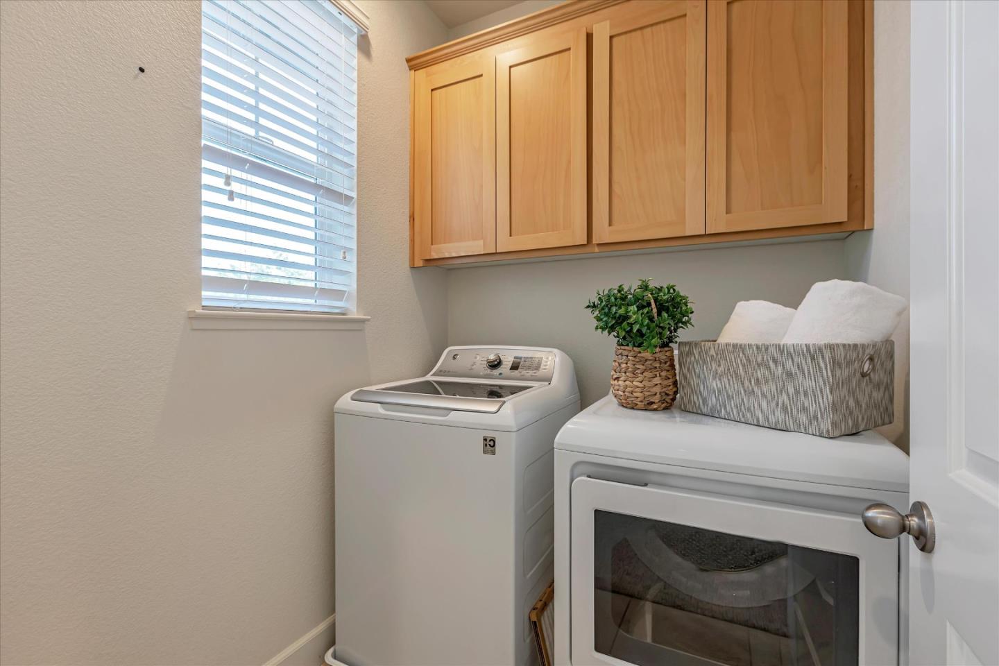 103 Incense Terrace Sunnyvale, CA 94086 - Photo 32 of 42 a utility room with dryer and washer