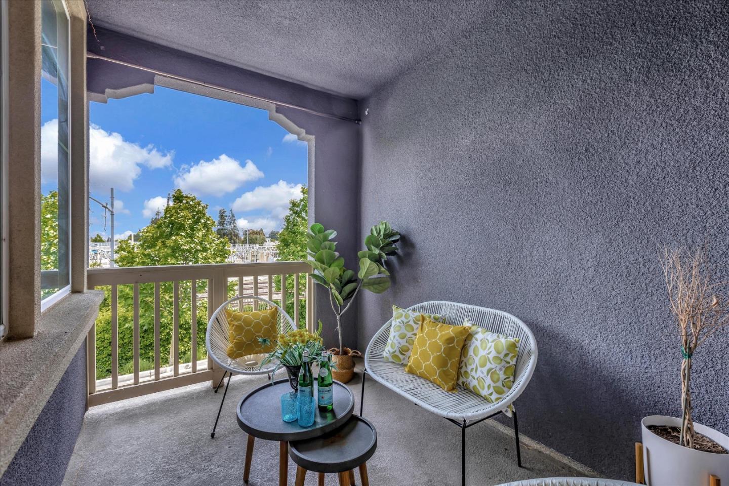 103 Incense Terrace Sunnyvale, CA 94086 - Photo 34 of 42 a view of a balcony with chair and glass door