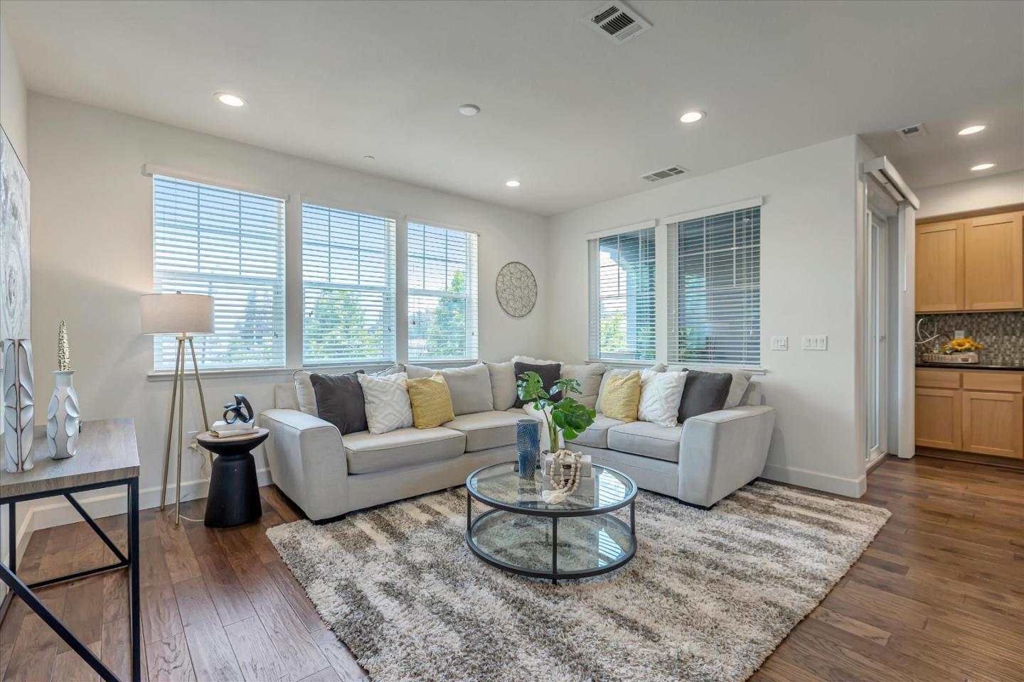 103 Incense Terrace Sunnyvale, CA 94086 - Photo 5 of 42 a living room with furniture and a large window