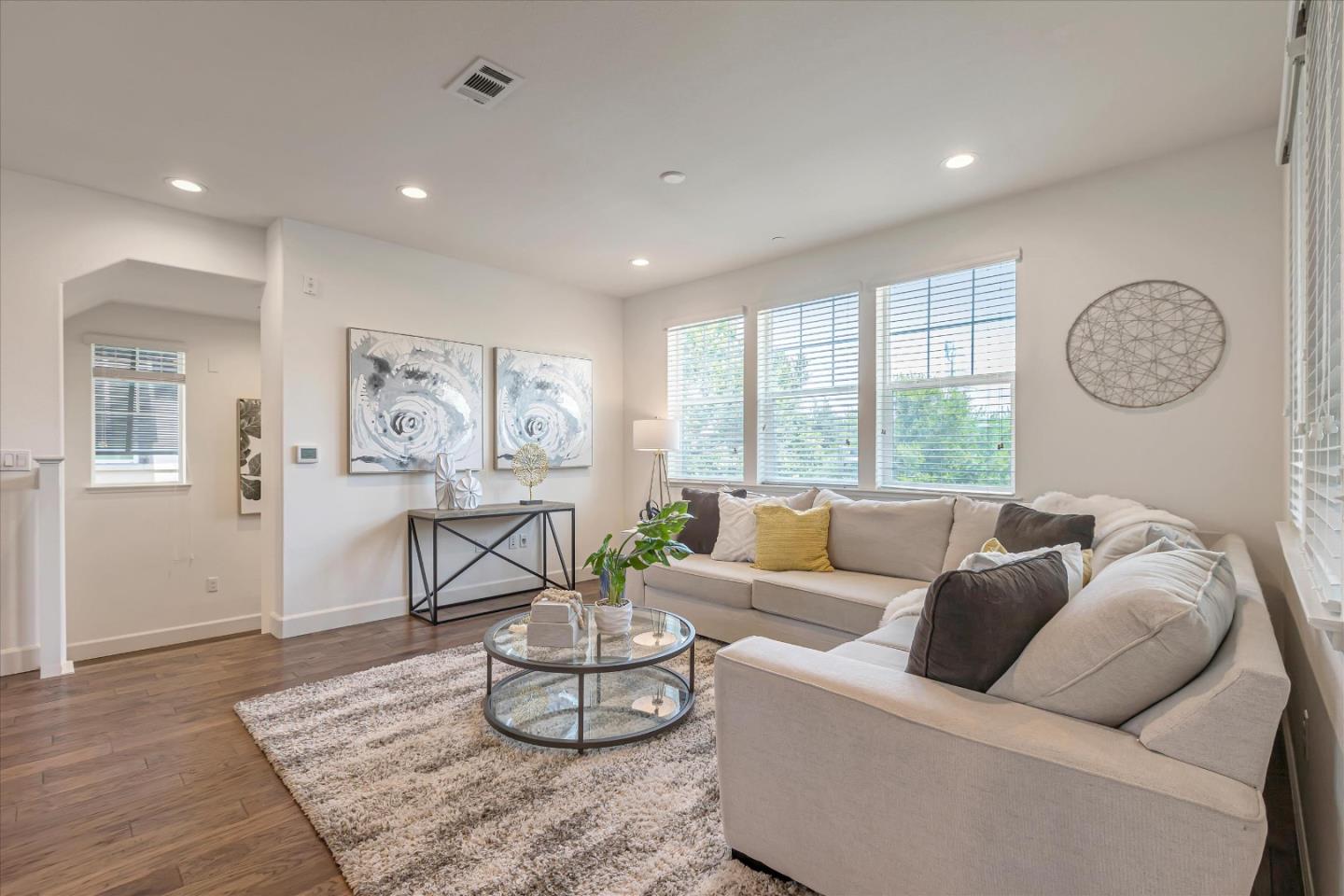103 Incense Terrace Sunnyvale, CA 94086 - Photo 7 of 42 a living room with furniture and a window
