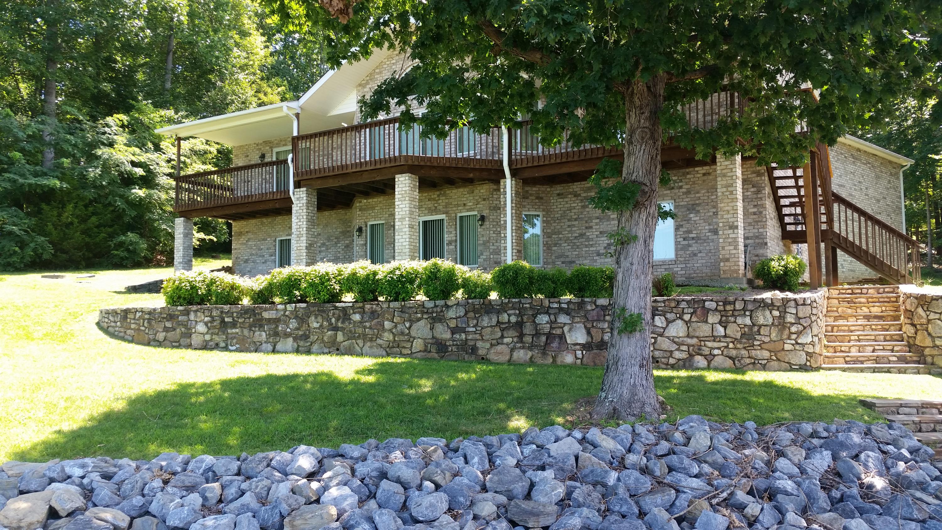 925 Somerset Cove Road Union Hall, VA 24176 - Photo 1 of 35 a front view of a house with garden
