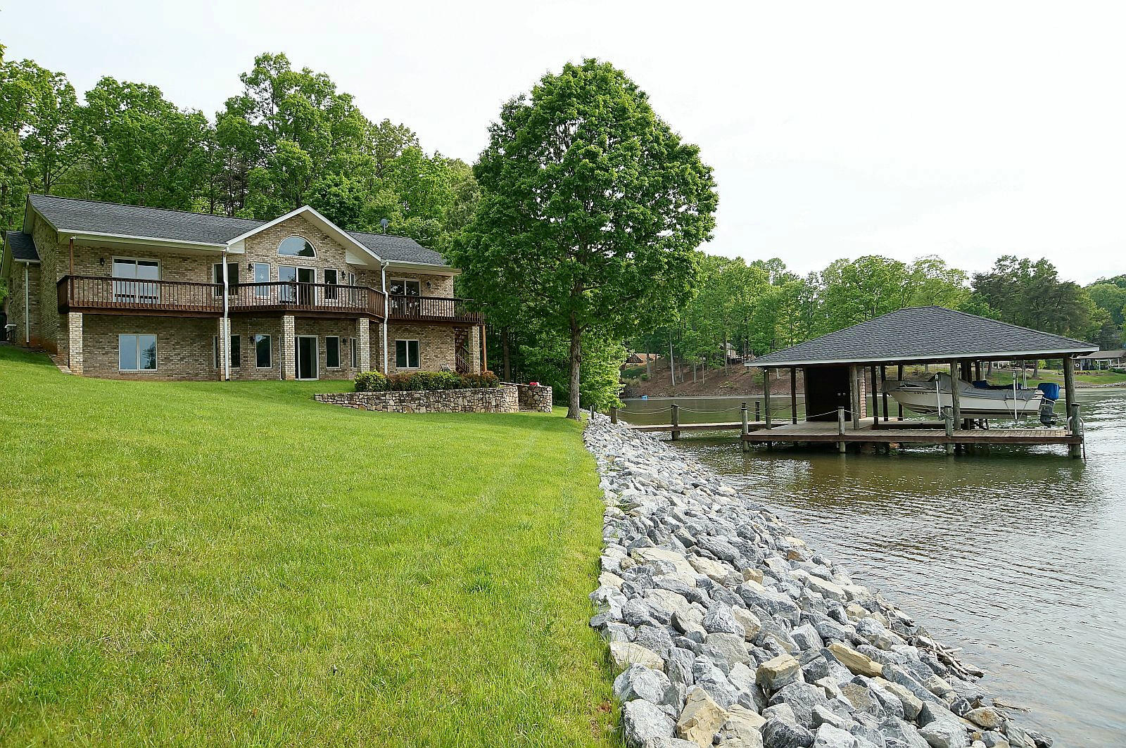 925 Somerset Cove Road Union Hall, VA 24176 - Photo 2 of 35 a front view of a house with garden