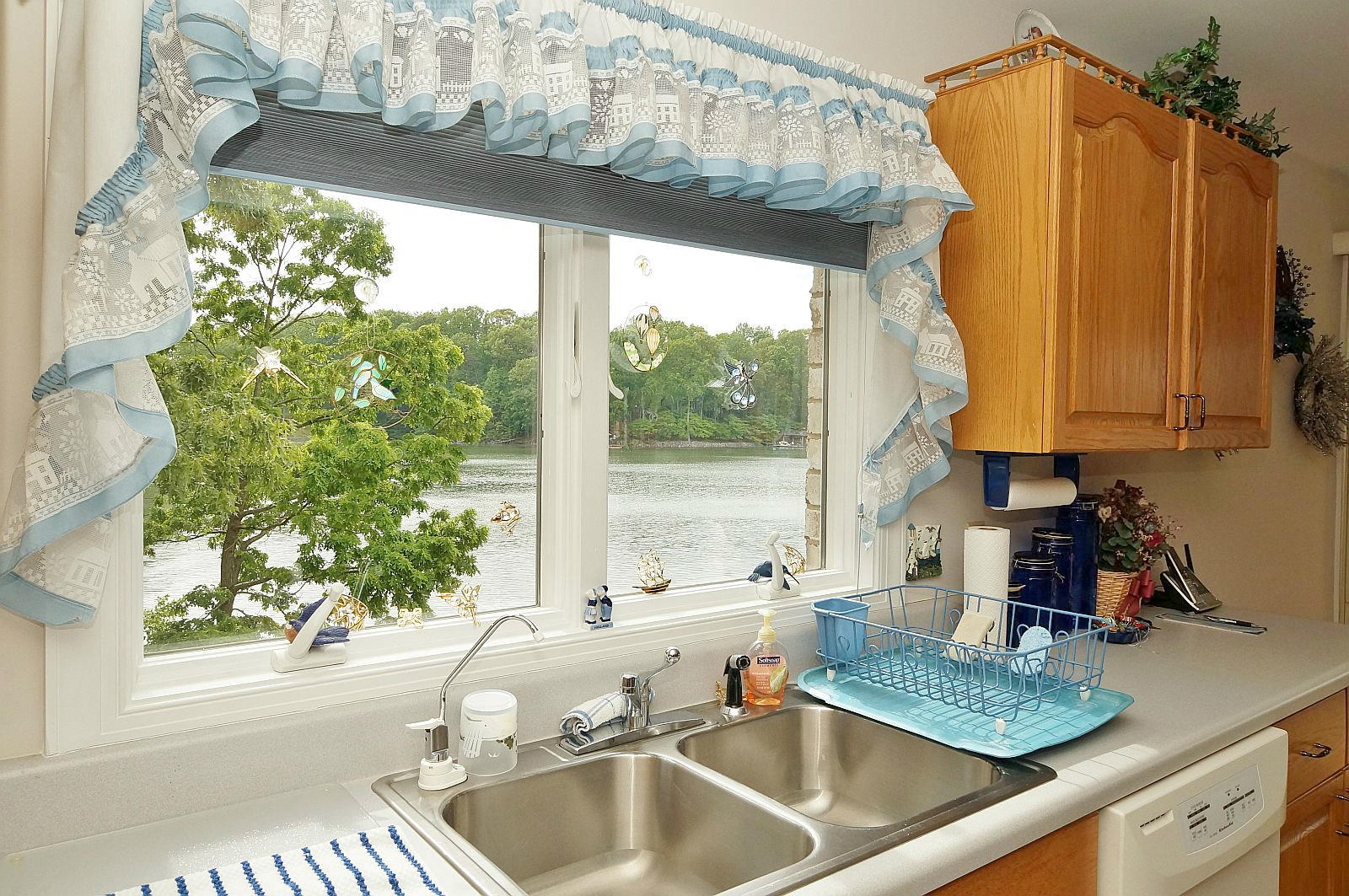 925 Somerset Cove Road Union Hall, VA 24176 - Photo 12 of 35 a kitchen with a sink a counter top space and a view of living room