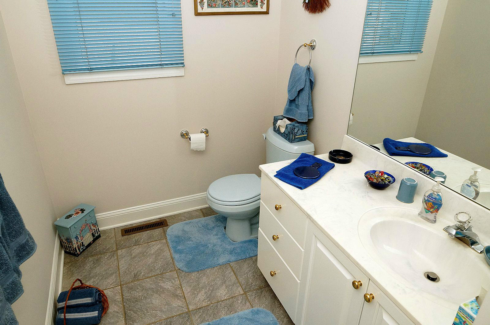 925 Somerset Cove Road Union Hall, VA 24176 - Photo 17 of 35 a bathroom with a sink toilet and a mirror
