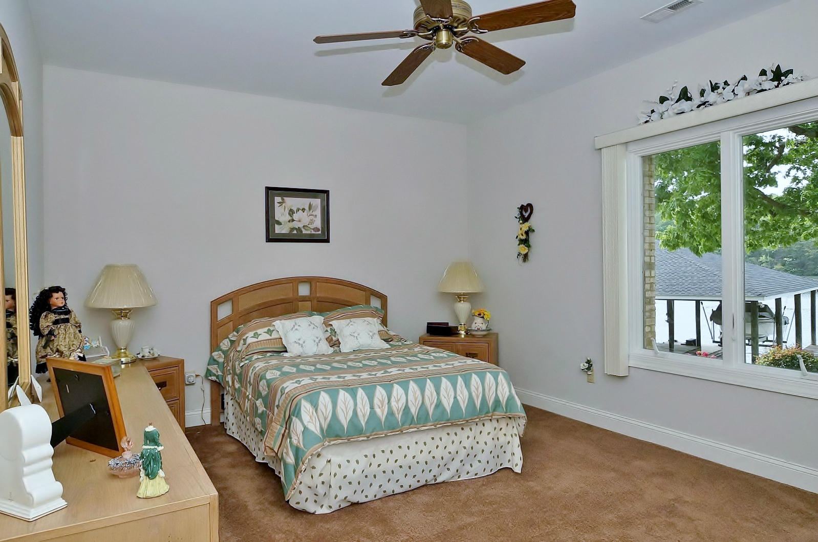 925 Somerset Cove Road Union Hall, VA 24176 - Photo 26 of 35 a bedroom with a bed and a large window